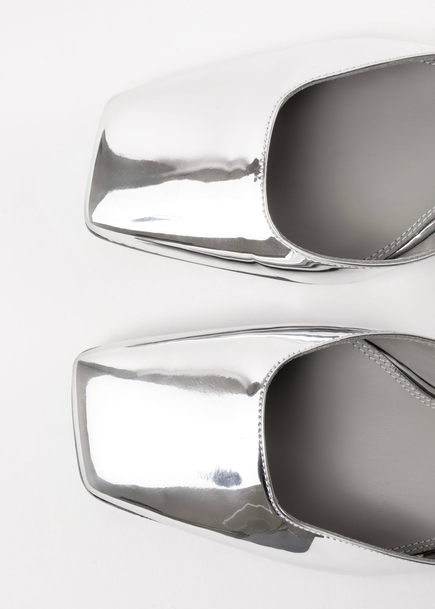 Close-up of haruko silver pumps