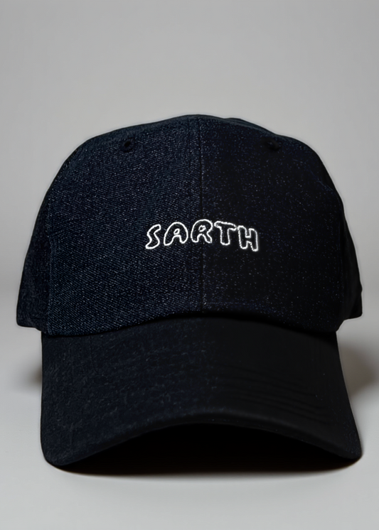 Black cap with 'SARTH' embroidered on a light gray background